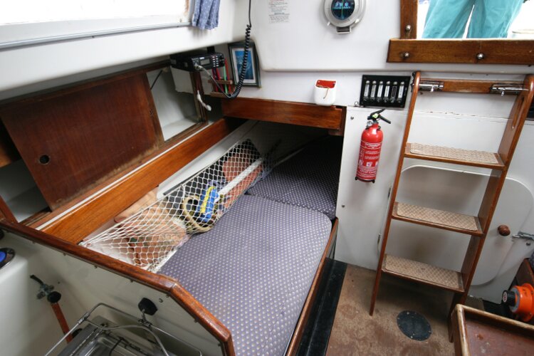 Master Marine Eygthene 24for sale The starboard quarter berth - The navigation table is situated above this berth, it is in the stowed position.