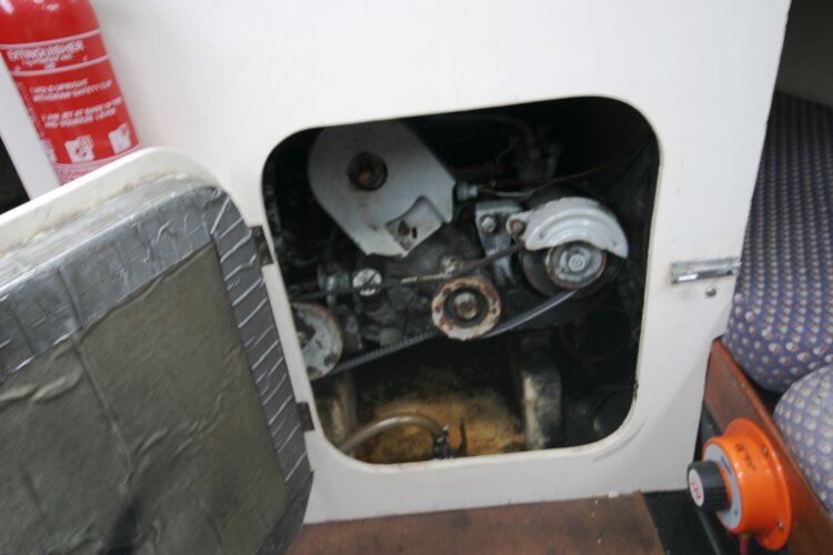 Master Marine Eygthene 24for sale The engine compartment - There is more access from each quarter berth
