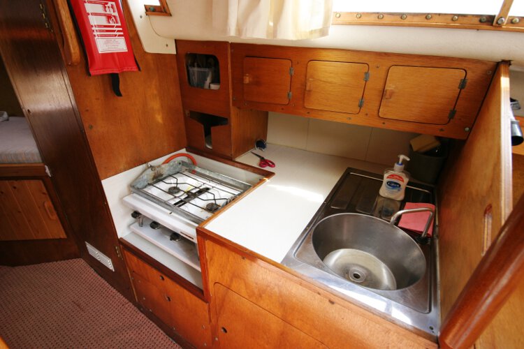 Colvic 26for sale The galley - This is located on the starboard side of the saloon, with ample storage