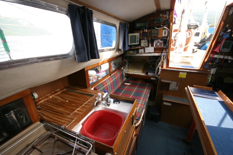 Westerly Renownfor sale Saloon looking aft past galley to nav station - Starboard side