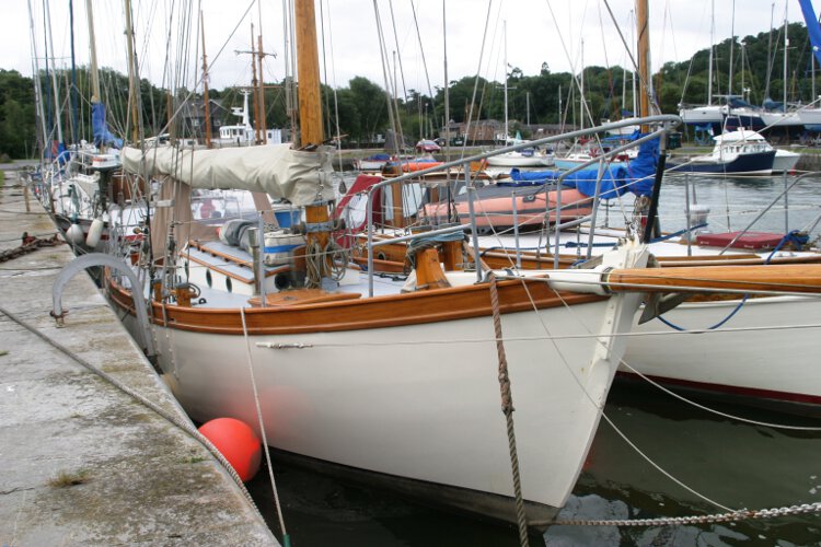 Wooden Classic Gaff cutterfor sale Alongside her berth - Seen from starboard bow