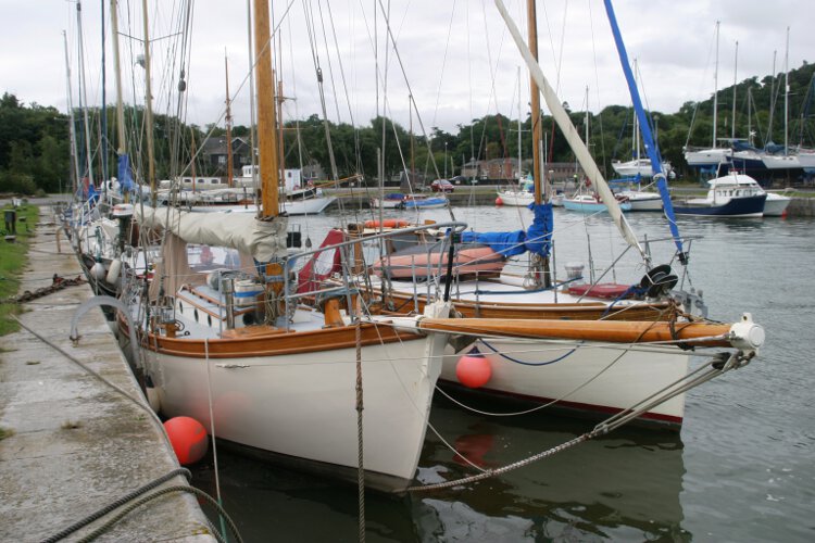 Wooden Classic Gaff cutterfor sale Seen from ashore - Note her bow sprit