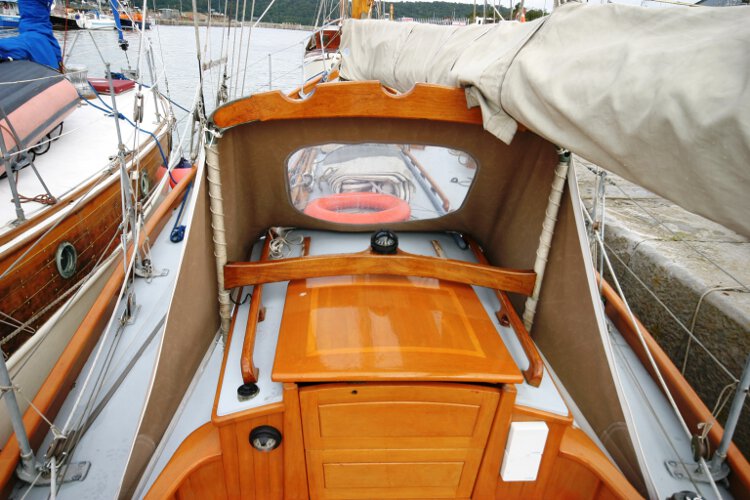 Wooden Classic Gaff cutterfor sale The main companionway - Looking under the spray hood