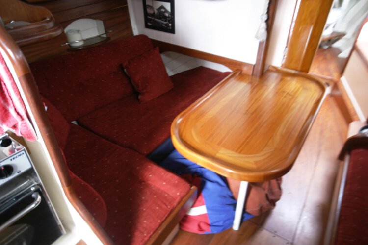 Wooden Classic Gaff cutterfor sale Saloon view - This is the port settee with the saloon table