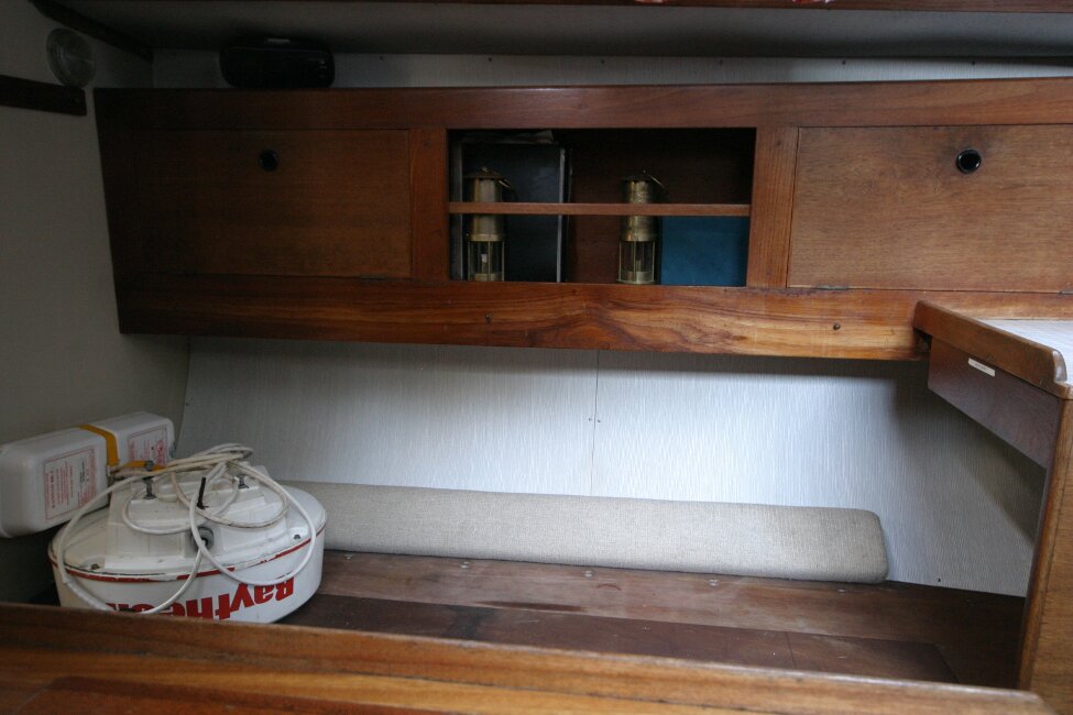 Nicholson 32 Mk Xfor sale Saloon - starboard seating and storage - Upholstery in storage.
