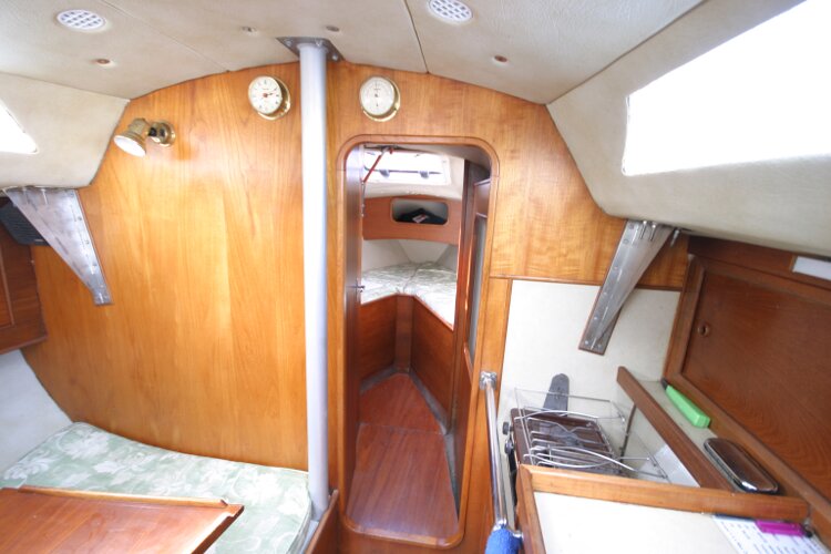 Colvic UFO 27for sale Looking past the galley area to the forward cabin entrance - 
