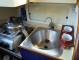 Wooden Classic 29 foot Bermudan Sloop Galley - stainless sink and good storage
