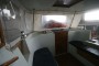 Nicholson 48 Wheelhouse looking aft showing aft cabin companionway